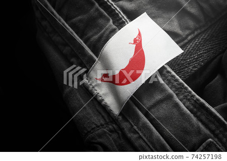Tag on dark clothing in the form of the flag of the Easter Island 74257198