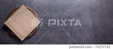 Pizza or bread cutting board for homemade baking on table. Food recipe concept at stone background 74257332