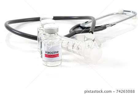 Vaccine coronavirus bottle and medical Syringe on a white background Vaccine coronavirus bottle and medical Syringe on a white background 74263088