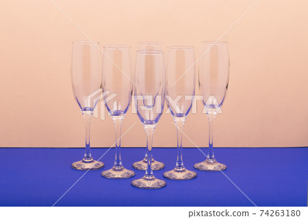 Set of luxury champagne glasses in a shape triangle. 74263180
