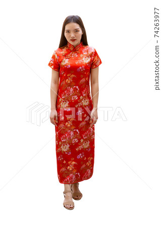 Chinese women dress with Cheongsam or Qipao traditional outfit for festive seasons Chinese New Year isolated on white background with clipping path. Chinese women dress with Cheongsam or Qipao traditional outfit for festive seasons Chinese New Year isolated on white background with clipping path. 74263977