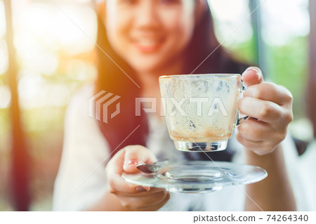 people happy drinking a cup of coffee for refreshing in the morning concept 74264340
