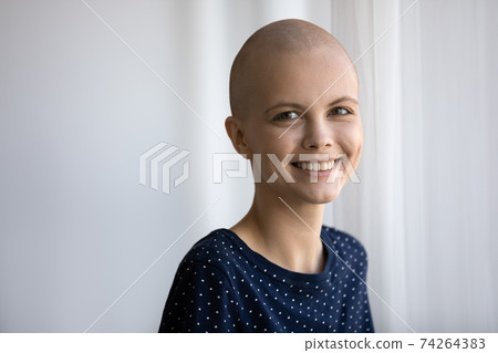 Portrait of happy hairless sick woman feel optimistic 74264383