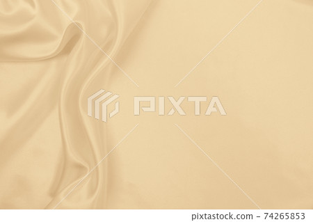 Smooth elegant golden silk or satin luxury cloth texture as wedding background. Luxurious background design. In Sepia toned. Retro style Smooth elegant golden silk or satin luxury cloth texture as wedding background. Luxurious background design. In Sepia toned. Retro style 74265853
