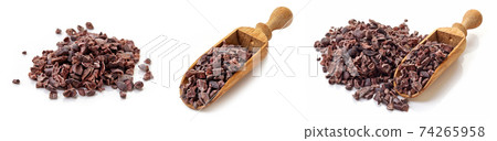 Heap of cacao nibs on white background 74265958