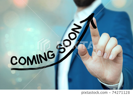 Handwriting text Coming Soon. Concept meaning Handwriting text Coming Soon. Concept meaning 74271128