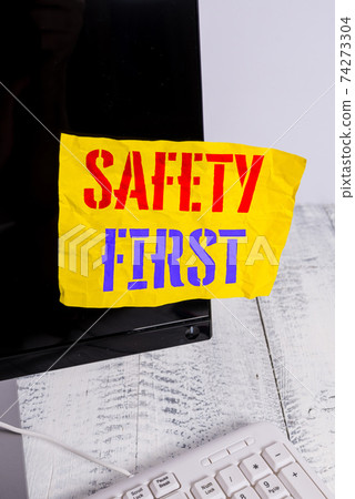 Writing note showing Safety First. Business photo Writing note showing Safety First. Business photo 74273304