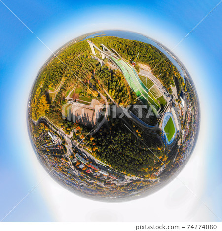 A three dimensional aerial panoramic view of Lahti sports centre with three ski jump towers 74274080