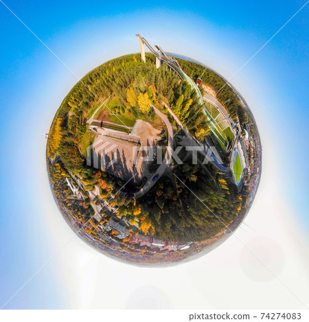 A three dimensional aerial panoramic view of Lahti sports centre with three ski jump towers A three dimensional aerial panoramic view of Lahti sports centre with three ski jump towers 74274083