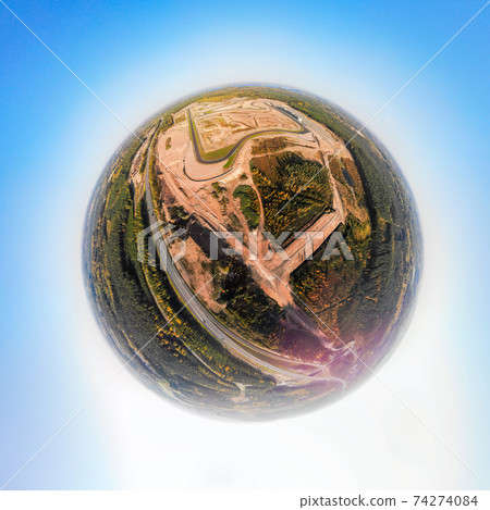 A three dimensional panoramic aerial view of the race track, in a mini planet panorama style. A three dimensional panoramic aerial view of the race track, in a mini planet panorama style. 74274084
