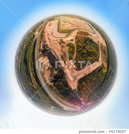 A three dimensional panoramic aerial view of the race track, in a mini planet panorama style. A three dimensional panoramic aerial view of the race track, in a mini planet panorama style. 74274087