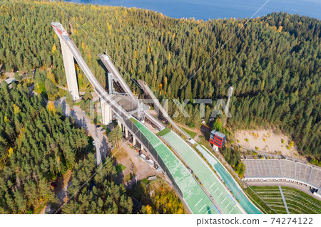 Aerial view of Lahti sports centre with three ski jump towers. Aerial view of Lahti sports centre with three ski jump towers. 74274122
