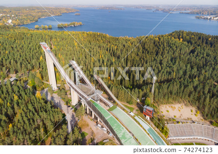 Aerial view of Lahti sports centre with three ski jump towers. 74274123