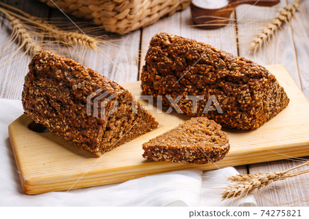 Closeup on sliced flourless diet grain bread  74275821