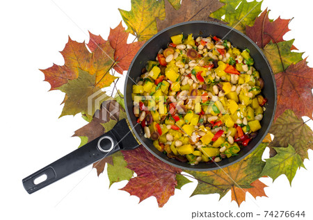 Frying pan with vegetable stew with pumpkin and white beans 74276644