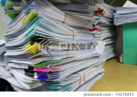 Close up stack of document at office Close up stack of document at office 74278853