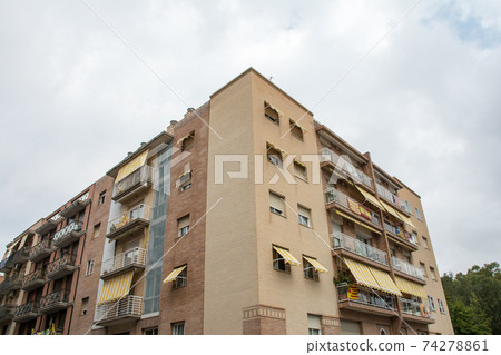 Cityscape of Tarragona, a suburb of Barcelona, Spain Brick apartment with light brown walls 74278861