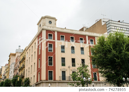Cityscape of Tarragona, a suburb of Barcelona, Spain Brick apartment with light brown walls Cityscape of Tarragona, a suburb of Barcelona, Spain Brick apartment with light brown walls 74278935