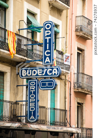 Cityscape of Tarragona, a suburb of Barcelona, Spain Light brown wall building and Spanish signboard Cityscape of Tarragona, a suburb of Barcelona, Spain Light brown wall building and Spanish signboard 74278937