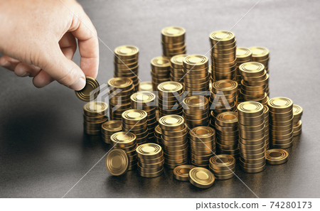 Rich man stacking golden money coins. Income saving plan. Rich man stacking golden money coins. Income saving plan. 74280173