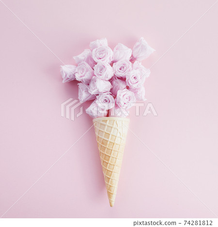 Ice cream cone with pink roses and hearts. Spring and summer Floral style. Flat lay 74281812