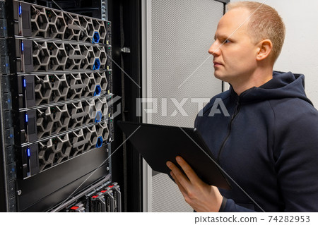 Technical Consultant With Digital Tablet Monitor Hyperconverged Servers Environment in Datacenter Technical Consultant With Digital Tablet Monitor Hyperconverged Servers Environment in Datacenter 74282953