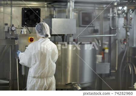Worker at Industrial Factory Back View Worker at Industrial Factory Back View 74282960