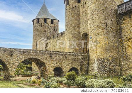 Entrance to the castle of Carcassonne in the south of France. Entrance to the castle of Carcassonne in the south of France. 74283631