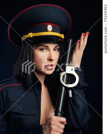 Portrait of a woman in a Russian police uniform English translation police 74284462