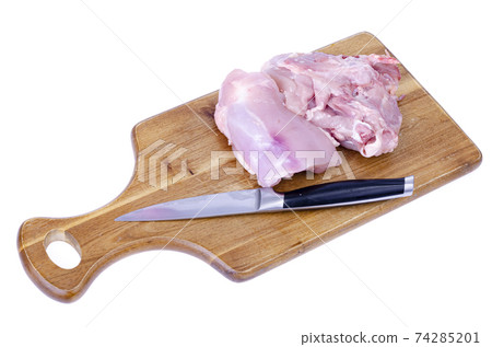 Raw meat. Two pieces of chicken thighs for cooking. Studio Photo Raw meat. Two pieces of chicken thighs for cooking. Studio Photo 74285201