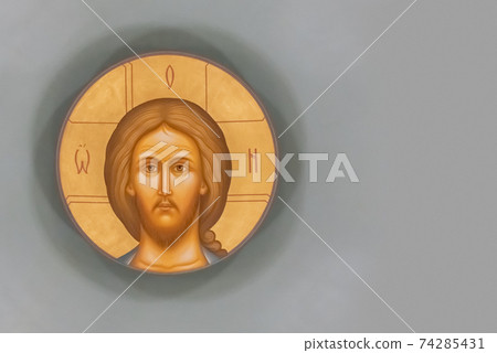 The face of Jesus Christ on the dome of the Cathedral of St. Alexander Nevsky. The face of Jesus Christ on the dome of the Cathedral of St. Alexander Nevsky. 74285431
