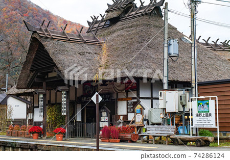 Fukushima Prefecture / Station building with thatched roof that is rarely found in Japan Aizu Railway Yunokami Onsen Station 74286124