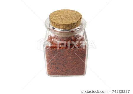 chilli pepper seedless flakes in a glass jar chilli pepper seedless flakes in a glass jar 74288227