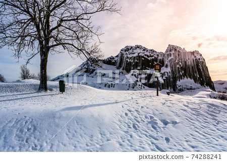 Rock organ pipes in winter time 74288241