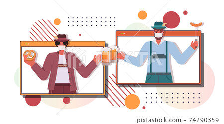couple in masks drinking beer discussing during video call Oktoberfest party celebration coronavirus quarantine 74290359