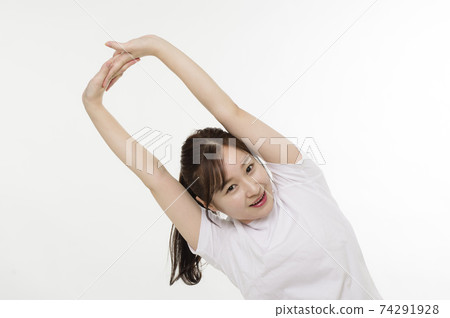 Women doing gymnastics to maintain their health Women doing gymnastics to maintain their health 74291928