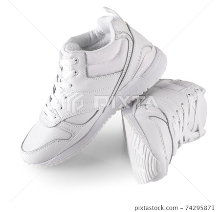 white women's winter sneakers isolated on white. Pair of trendy women white women's winter sneakers isolated on white. Pair of trendy women 74295871