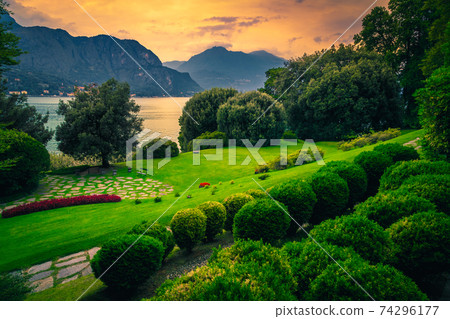 Beautiful ornamental garden on the shore of the lake Como 74296177