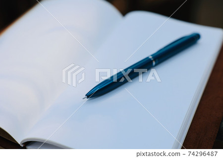 Pocketbook and ballpoint pen Pocketbook and ballpoint pen 74296487