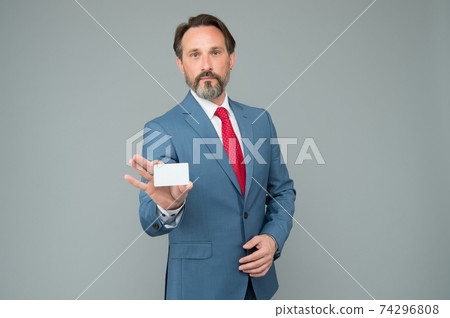 Business consultant man offering services plastic card, personal contact concept Business consultant man offering services plastic card, personal contact concept 74296808