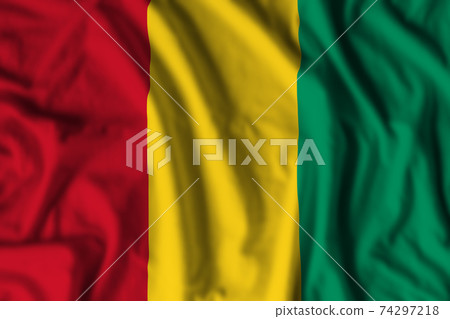 Guinea flag realistic waving 74297218