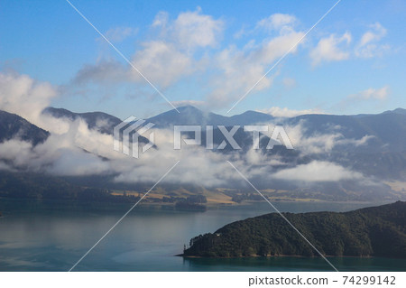 Mount Stokes and bay on a summer morning. Mount Stokes and bay on a summer morning. 74299142