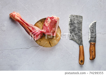 Overhead view of raw fresh deer shank with spice and herb Overhead view of raw fresh deer shank with spice and herb 74299355