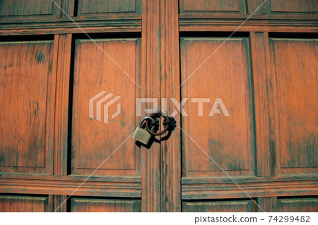Korean traditional wooden door at Yeongnamnu pavilion in Miryang, Korea Korean traditional wooden door at Yeongnamnu pavilion in Miryang, Korea 74299482