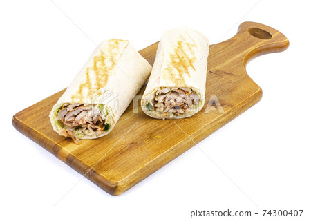 Shawarma, lavash with meat and vegetables. Photo Shawarma, lavash with meat and vegetables. Photo 74300407
