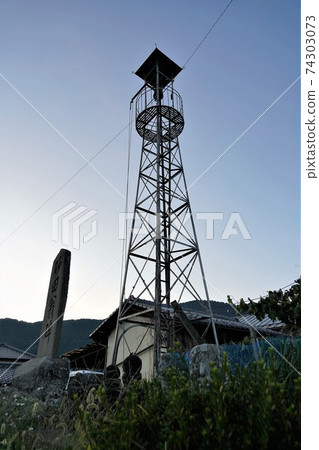 A half bell on the fire lookout tower that convenes a rural fire brigade A half bell on the fire lookout tower that convenes a rural fire brigade 74303073