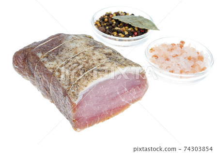 Piece dried pork meat with spices on white background. 74303854