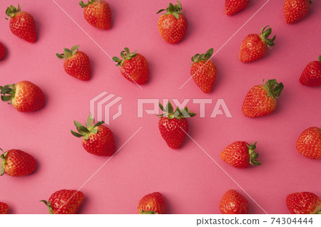 Pink background and strawberry Pink background and strawberry 74304444