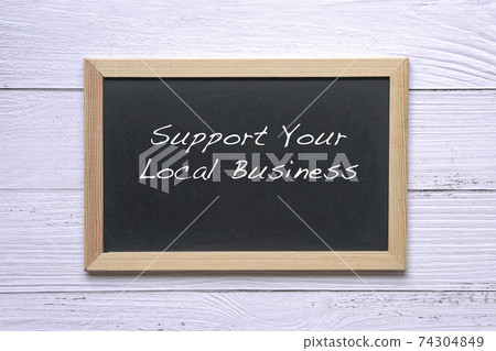 Support Your Local Business, words written on blackboard. 74304849