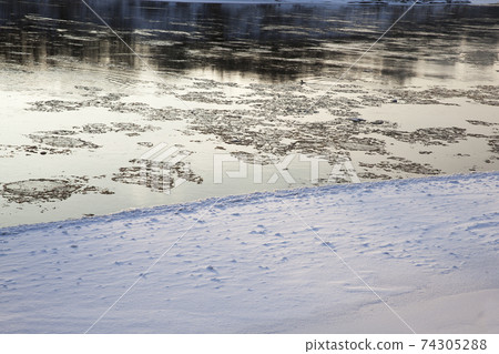 frozen lake in winter cold weather frozen lake in winter cold weather 74305288